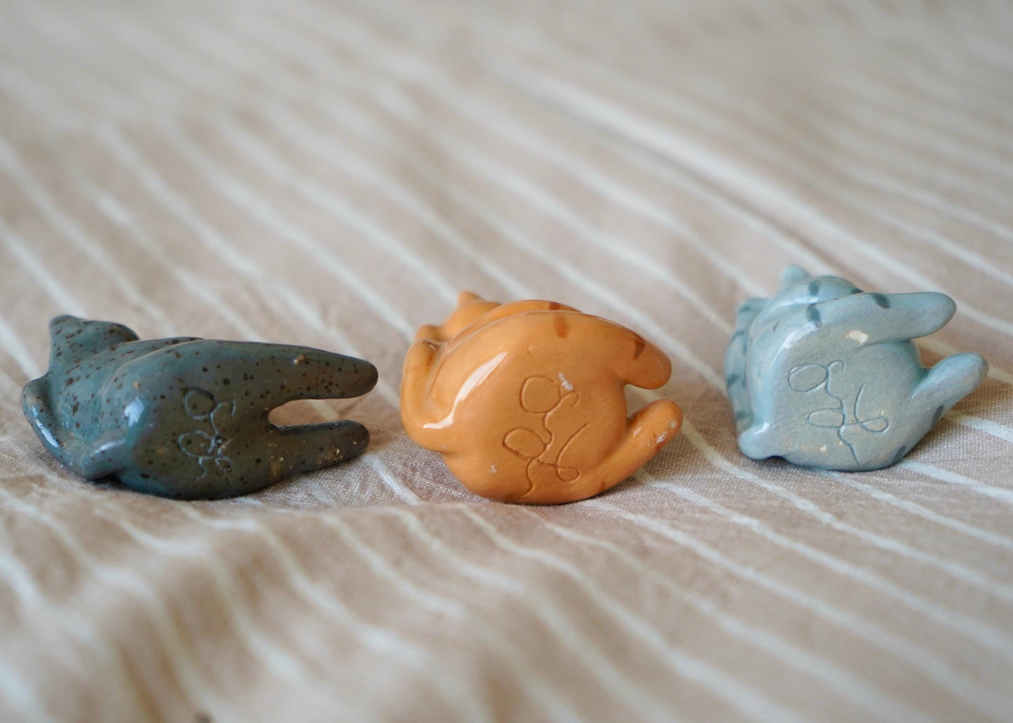 chubby dark grey speckled cat miniature figurine