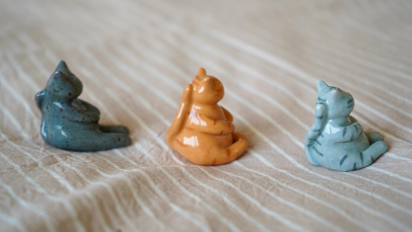 chubby dark grey speckled cat miniature figurine