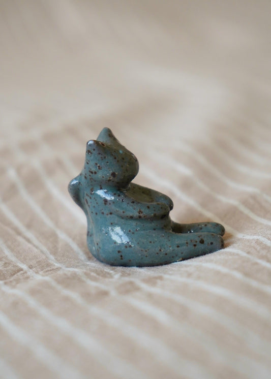 chubby dark grey speckled cat miniature figurine