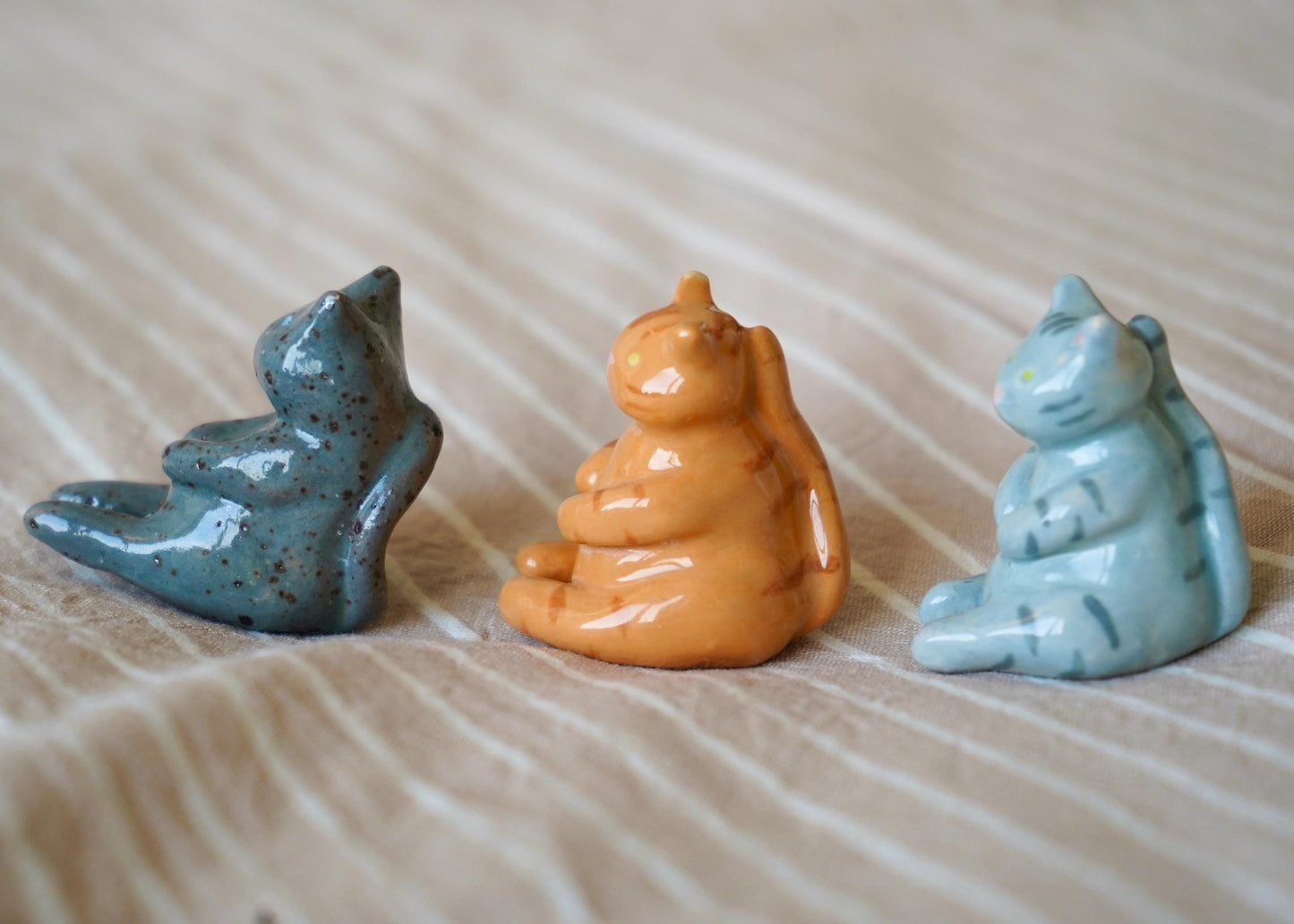 chubby dark grey speckled cat miniature figurine