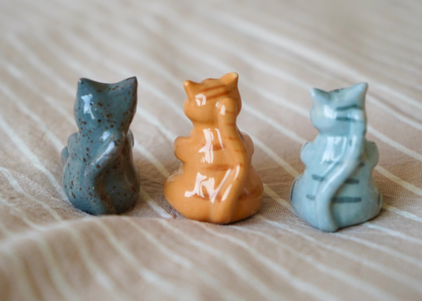 chubby dark grey speckled cat miniature figurine